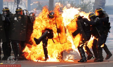 تصاویر دلخراش به آتش کشیدن چند پلیس به دست معترضان فرانسوی